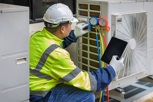 Professional Heat Pump Repair technician working in Indian Hills, KY